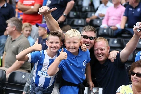 Brighton and Hove Albion: Euphoric Fans Celebrate Championship Victory at Craven Cottage (15-08-2015)