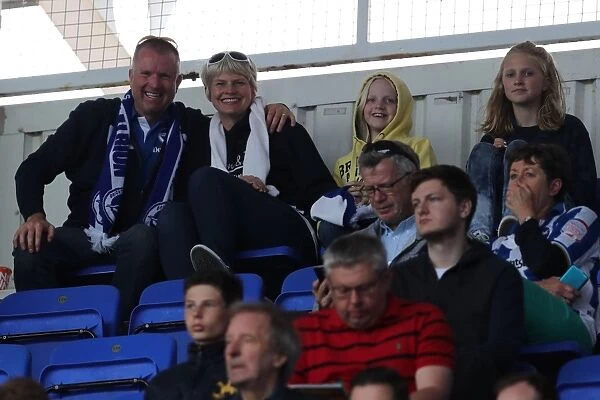 Brighton and Hove Albion Fans in Full Throat: Passionate Support at the Reading Championship Match, 2016