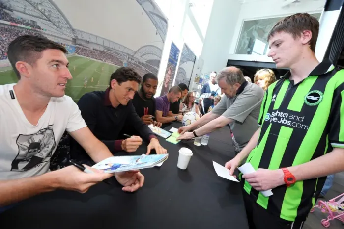 Framed Print : Brighton & Hove Albion FC: 2013 Club Shop Signing Event - Fans Engage with Players Framed Print : Brighton & Hove Albion FC: 2013 Club Shop Signing Event - Fans Engage with Players