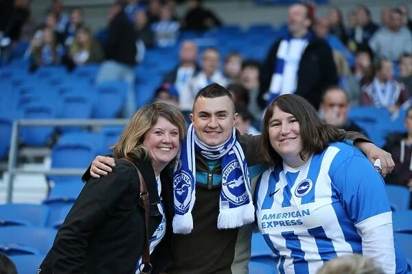 Brighton and Hove Albion FC: Passionate Fans in Action during the Sky Bet Championship Clash against AFC Bournemouth (10APR15)