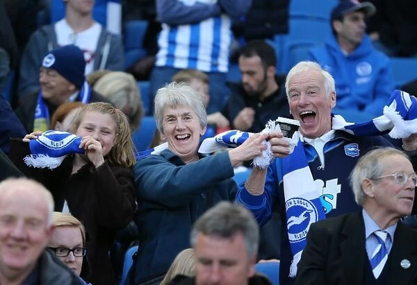 Brighton and Hove Albion FC: Passionate Fans in Action during the Sky Bet Championship Clash vs. AFC Bournemouth (10APR15)