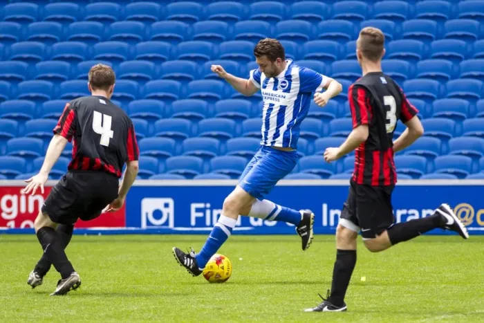 Framed Print : Brighton & Hove Albion: Staff Match, May 25, 2015 - A Unified Team on the Pitch
