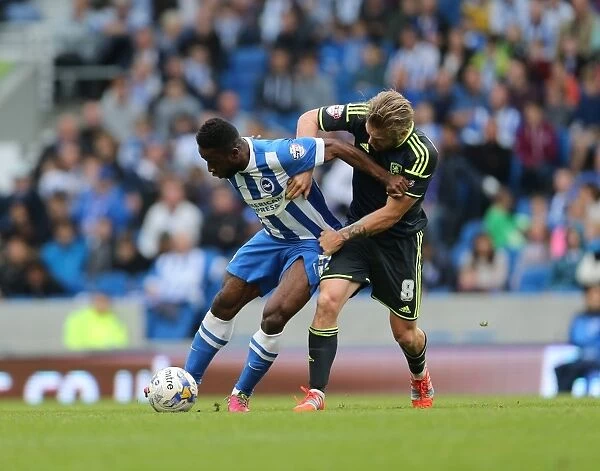 Brighton & Hove Albion vs Middlesbrough: Kazenga LuaLua Fights for Possession