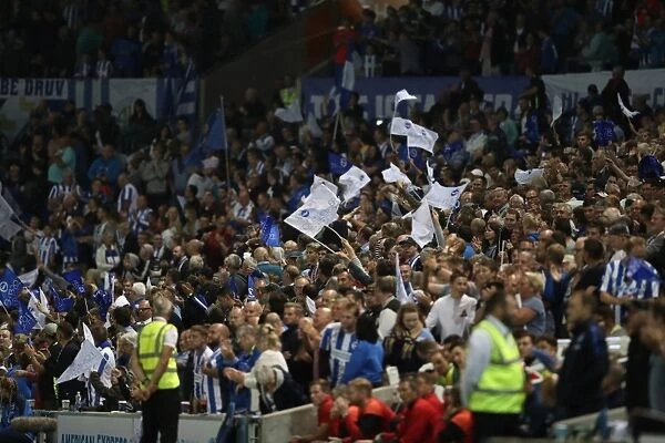 Brighton and Hove Albion vs. Nottingham Forest: Seafront Showdown - Fans Unite with Flags at the American Express Community Stadium (12th August 2016)
