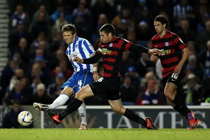 Framed Print : Brighton & Hove Albion vs Peterborough Utd: Dean Hammond Crosses the Ball at Amex Stadium (November 6, 2012)