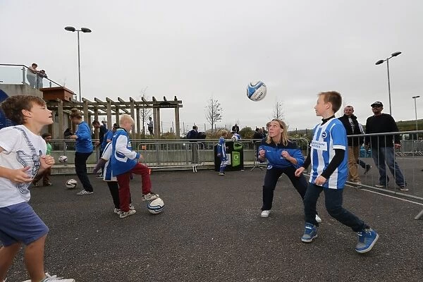 Brighton and Hove Albion Women's Team: Empowering the Next Generation at the Fanzone Ahead of the Match vs. Middlesbrough (October 18, 2014)