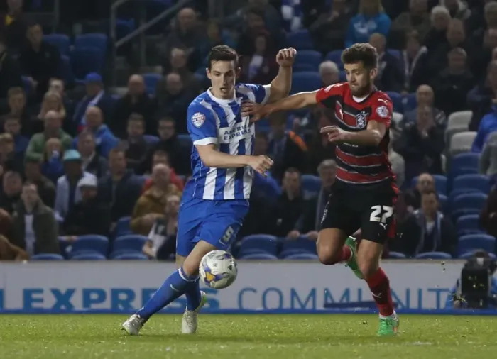 Framed Print : Brighton & Hove Albion's Lewis Dunk in Action Against Huddersfield Town (April 2015) Framed Print : Brighton & Hove Albion's Lewis Dunk in Action Against Huddersfield Town (April 2015)