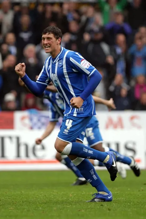 Framed Print : Brighton and Hove Albion's Unyielding Defender: Tommy Elphick Framed Print : Brighton and Hove Albion's Unyielding Defender: Tommy Elphick