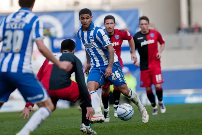 Framed Print : Championship Clash: Liam Bridcutt's Intense Duel Against Portsmouth at Amex Stadium (March 10, 2012) Framed Print : Championship Clash: Liam Bridcutt's Intense Duel Against Portsmouth at Amex Stadium (March 10, 2012)