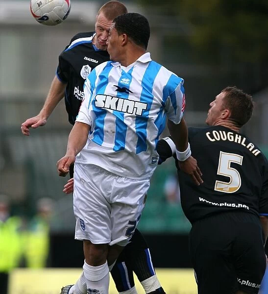 Colin Kazim-Richards Battles for the Ball: A Moment from the April 2006 Match against Sheffield Wednesday at The Withdean
