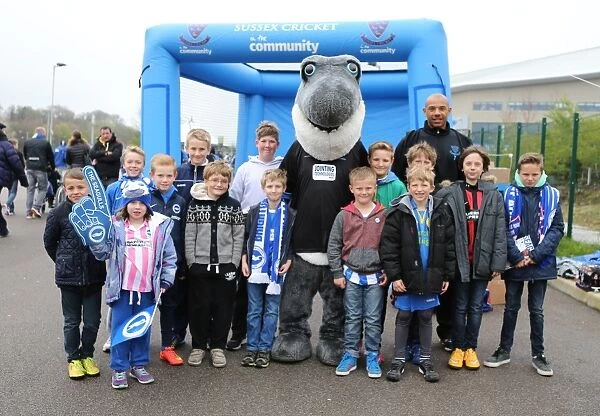 Cricket Interlude: Tymal Mills and Sharky Amuse Fans during Brighton & Hove Albion vs. Watford Championship Match (25APR15)