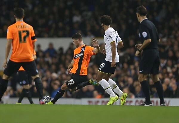 Danny Holla of Brighton and Hove Albion Faces Off Against Tottenham Hotspur in the Capital One Cup