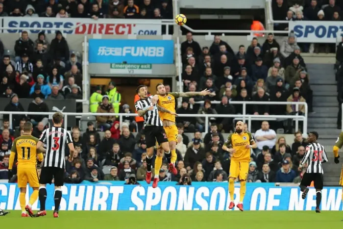 Framed Print : Dunk vs. Joselu: Intense Battle Between Newcastle and Brighton Defender and Forward in Premier League Clash (30DEC17)