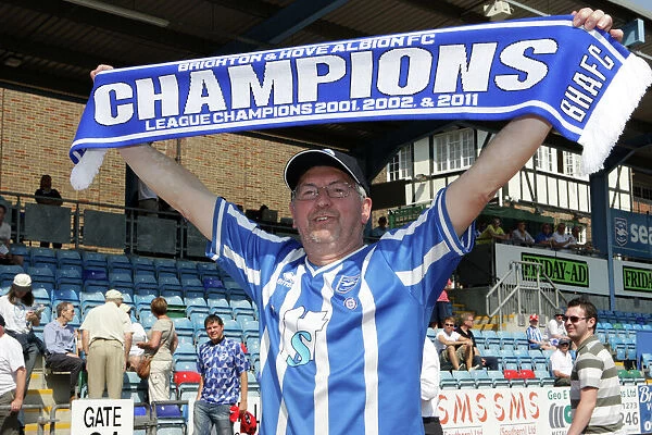 A fan celebrates our League 1 success in 2011