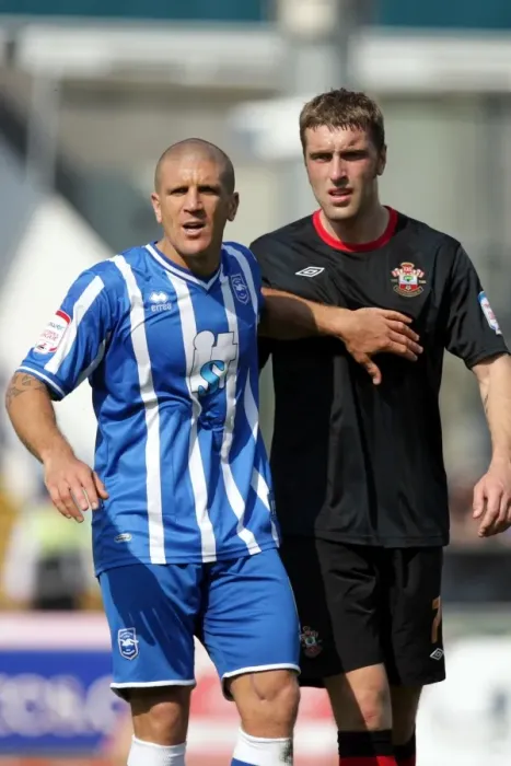 Framed Print : The Focused Defender: An In-Depth Analysis of Brighton & Hove Albion's Adam El-Abd