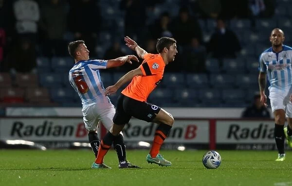 Gary Gardner Takes on Brighton and Hove Albion in Championship Clash at Huddersfield, 2014