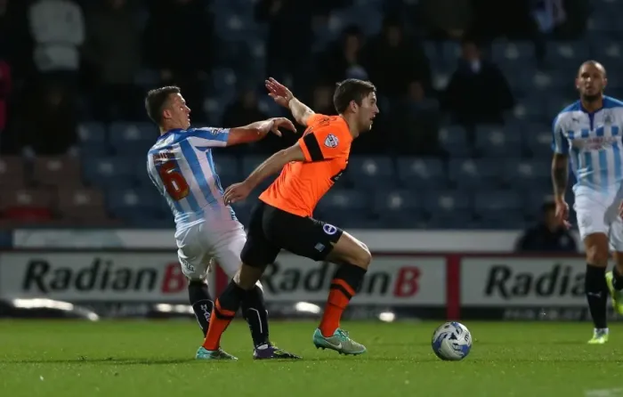 Framed Print : Gary Gardner Takes on Brighton and Hove Albion in Championship Clash at Huddersfield, 2014 Framed Print : Gary Gardner Takes on Brighton and Hove Albion in Championship Clash at Huddersfield, 2014