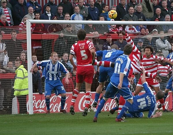 Goalmouth scramble in the Albion penalty area
