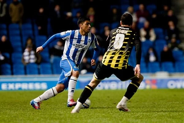 Gonzalo Jara Reyes goes past Don Cowie during Brighton & Hove Albion v Cardiff City v Npower Championship, American Express Community Stadium, Brighton, Wed 7th