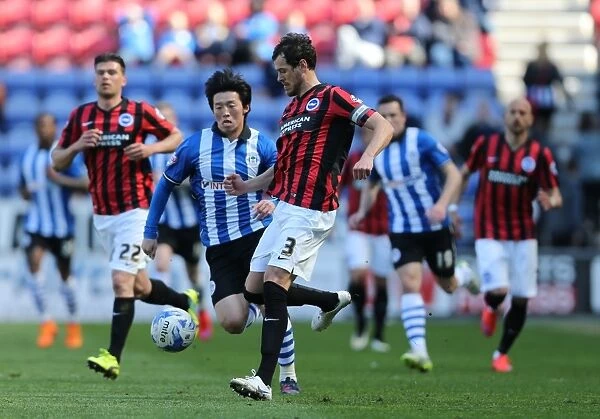 Gordon Greer Leads Brighton and Hove Albion in Championship Battle against Wigan Athletic (18APR15)