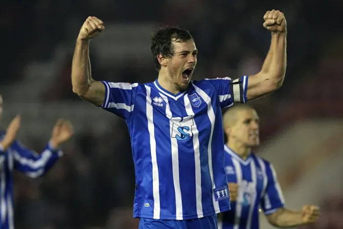 Framed Print : Gordon Greer: The Unyielding Icon of Brighton and Hove Albion FC