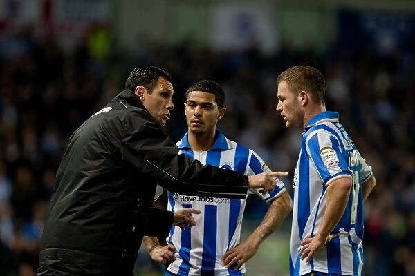 Gus Poyet Conferencing with Liam Bridcutt and Alan Navarro During Brighton & Hove Albion vs Derby County, March 20, 2012