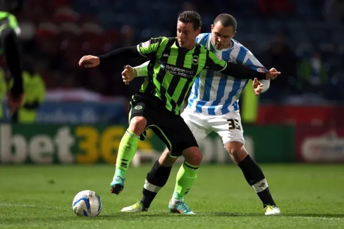 Framed Print : Hoskins vs Lynch: Intense Battle in Huddersfield's Championship Clash between Brighton and Wolves - 12th November 2012