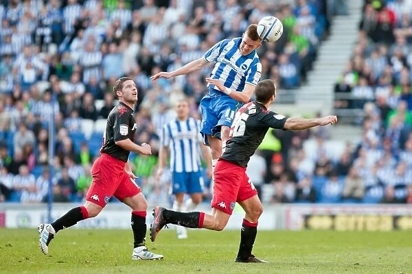 Intense Action: Craig Noone vs Portsmouth in the Championship Clash at Amex Stadium (March 10, 2012)