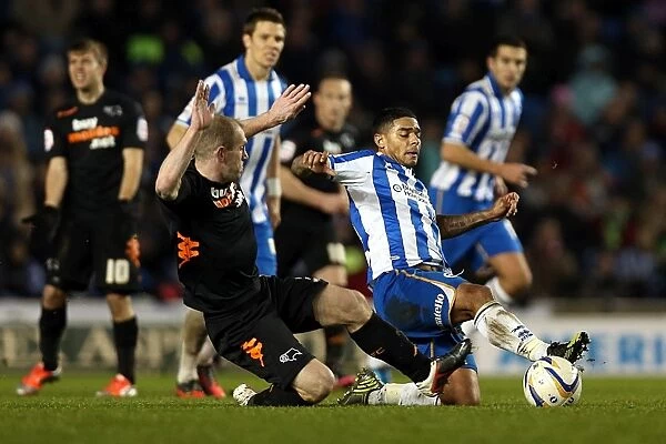 Intense Championship Clash: Liam Bridcutt's Tackle Against Derby County (Brighton & Hove Albion vs Derby County, January 12, 2013)
