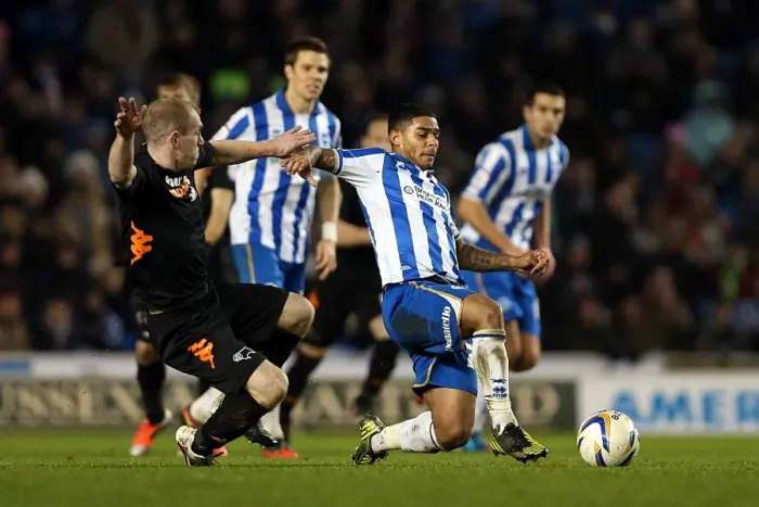 Framed Print : Intense Championship Showdown: Liam Bridcutt's Crunching Tackle Against Derby County (January 12, 2013)