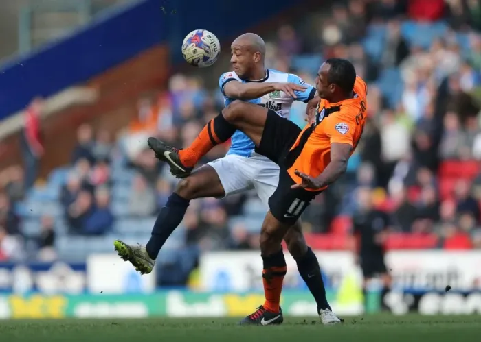 Framed Print : Intense Face-Off: Chris O'Grady vs. Alex Baptiste in the Championship Clash between Blackburn Rovers and Brighton & Hove Albion (21MAR15) Framed Print : Intense Face-Off: Chris O'Grady vs. Alex Baptiste in the Championship Clash between Blackburn Rovers and Brighton & Hove Albion (21MAR15)