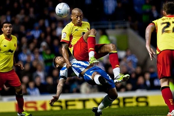 Intense Moment: Liam Bridcutt Tackles Chris Iwelumo in Brighton & Hove Albion vs. Watford (April 17, 2012)