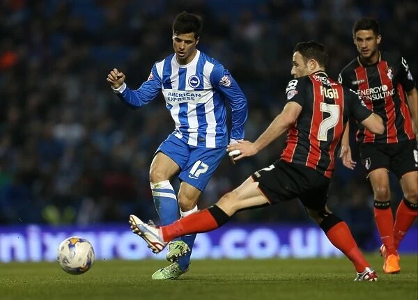 Joao Carlos Teixeira in Action: Brighton Midfielder Fights for Possession against AFC Bournemouth (April 10, 2015)