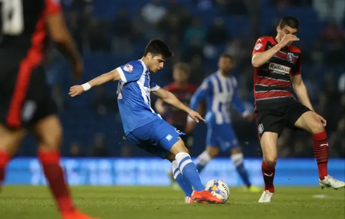 Framed Print : Joao Carlos Teixeira in Action: Brighton Midfielder Fights for Possession against Huddersfield Town (April 2015) Framed Print : Joao Carlos Teixeira in Action: Brighton Midfielder Fights for Possession against Huddersfield Town (April 2015)