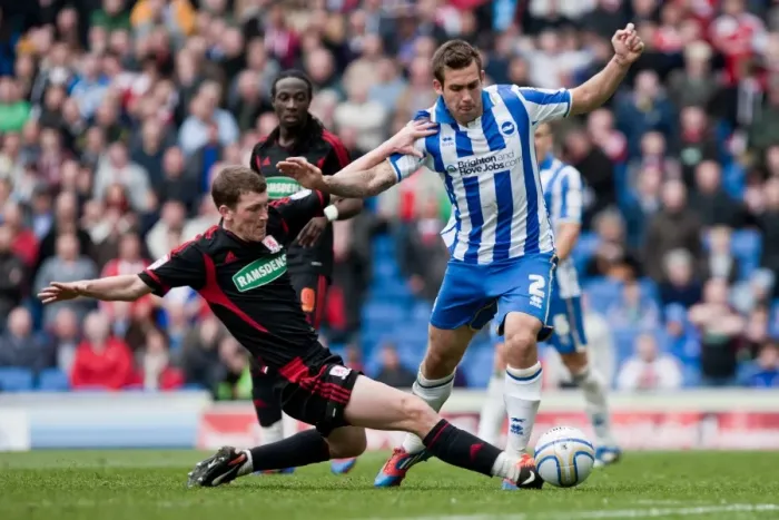 Framed Print : Joe Mattock Faces Tough Challenge in Brighton & Hove Albion vs Middlesbrough Championship Match, March 2012
