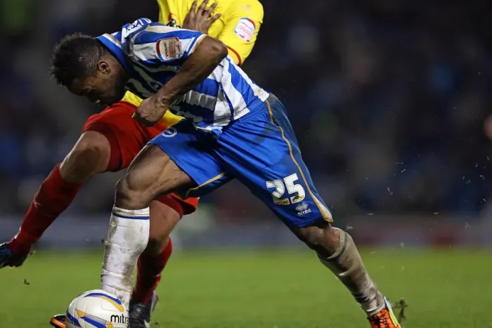 Framed Print : Kazenga LuaLua Charges Forward in Intense Brighton & Hove Albion vs Watford Championship Clash (December 2012) Framed Print : Kazenga LuaLua Charges Forward in Intense Brighton & Hove Albion vs Watford Championship Clash (December 2012)