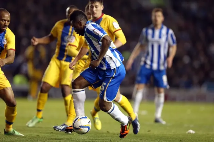 Framed Print : Kazenga LuaLua's Thrilling Aerial Battle: Brighton & Hove Albion vs. Crystal Palace in Championship Play-Off Semi-Final (May 13, 2013)