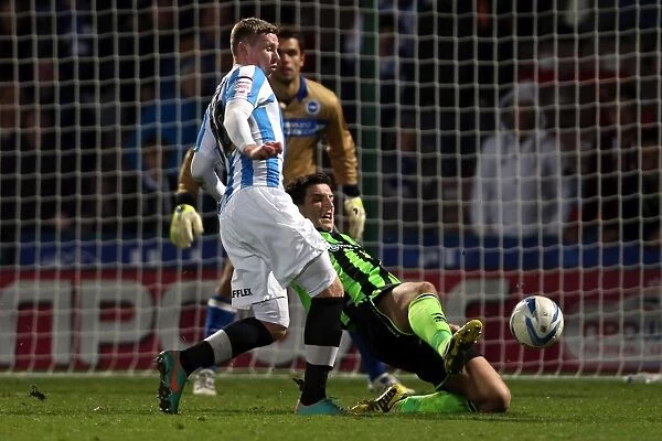 Lewis Dunk's Determined Slide Tackle in Brighton & Hove Albion's Win Against Huddersfield Town, Championship 2012