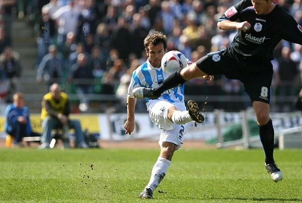 Paul Reid Sends the Ball Upfield: A Moment from Brighton & Hove Albion's Battle against Sheffield Wednesday at The Withdean (April 17, 2006)