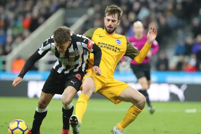 Framed Print : Propper Tackles Gayle: Intense Midfield Battle in Newcastle vs. Brighton (30DEC17)