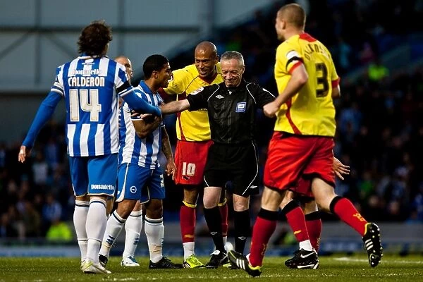 Referee Scott Mathieson Overseeing Tense Moment between Brighton & Hove Albion and Watford, April 17, 2012