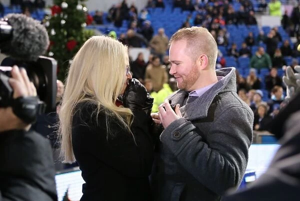 A Romantic Moment at the Football Field: Jamie Howell Proposes to Kristina Sinclair during Brighton and Hove Albion vs. Millwall (12DEC14)