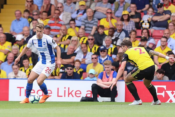 Solly March vs. Daryl Janmaat: Intense Midfield Battle at Vicarage Road - Watford vs. Brighton and Hove Albion, Premier League (11AUG18)