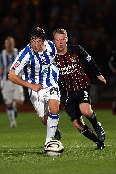 Tommy Elphick in action against Man City