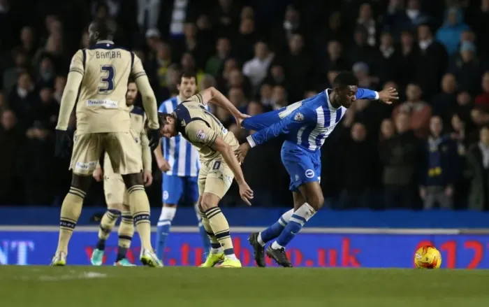 Framed Print : Tug-of-War in Midfield: Rohan Ince Caught in the Middle during Brighton & Hove Albion vs Leeds United (24FEB15) Framed Print : Tug-of-War in Midfield: Rohan Ince Caught in the Middle during Brighton & Hove Albion vs Leeds United (24FEB15)