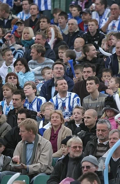 United in Support: A Family's Passionate Display for Brighton & Hove Albion vs. Nottingham Forest