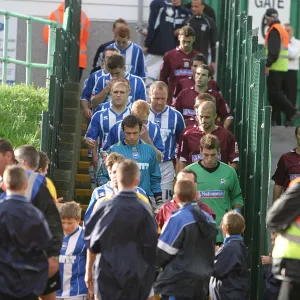 the Albion & Northampton teams leave the Withdean dressing rooms