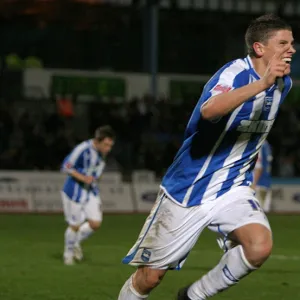 Alex Revell celebrates his goal against Stafford Rangers