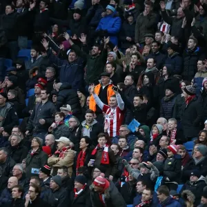 Brentford Fans Amidst the Action: Brighton & Hove Albion vs. Brentford (17Jan15)