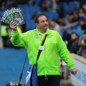 Brighton and Hove Albion FC: Programme Seller at American Express Community Stadium during Sky Bet Championship Match vs Nottingham Forest (07FEB15) Brighton and Hove Albion FC: Programme Seller at American Express Community Stadium during Sky Bet Championship Match vs Nottingham Forest (07FEB15)
